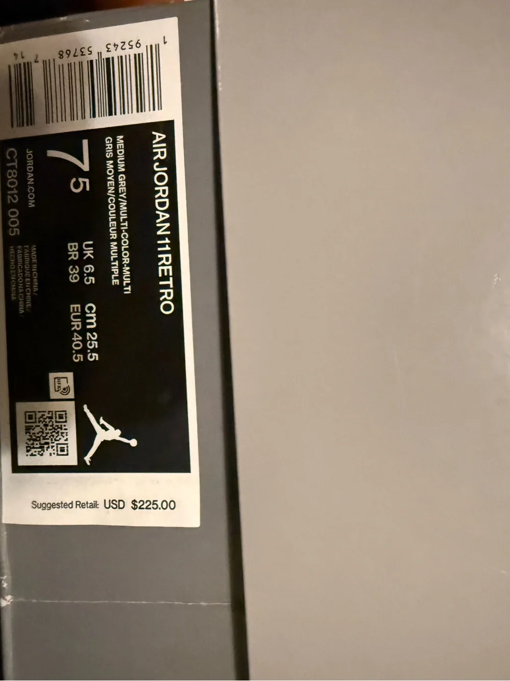 Jordan Retro 11 High-Top Sneakers in Grey and White